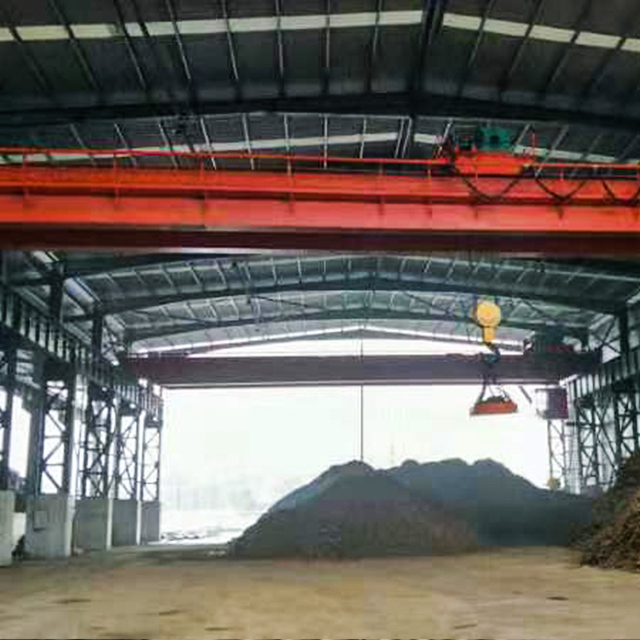 Overhead crane with electromagnetic beam